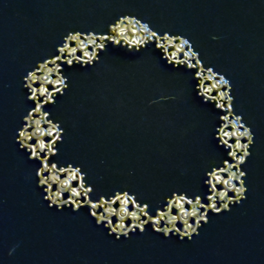 Antique silvertone bracelet. (#137)